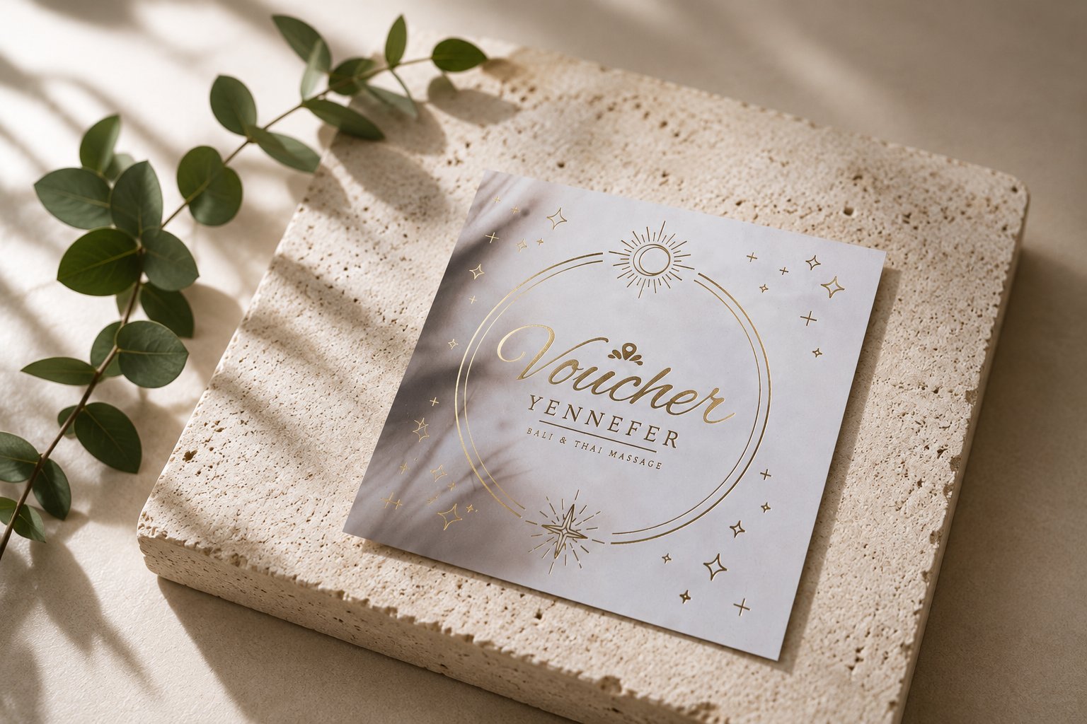 Voucher prezentowy Yennefer Bali & Thai Massage Salon na trawertynowej płycie z gałązką eukaliptusa